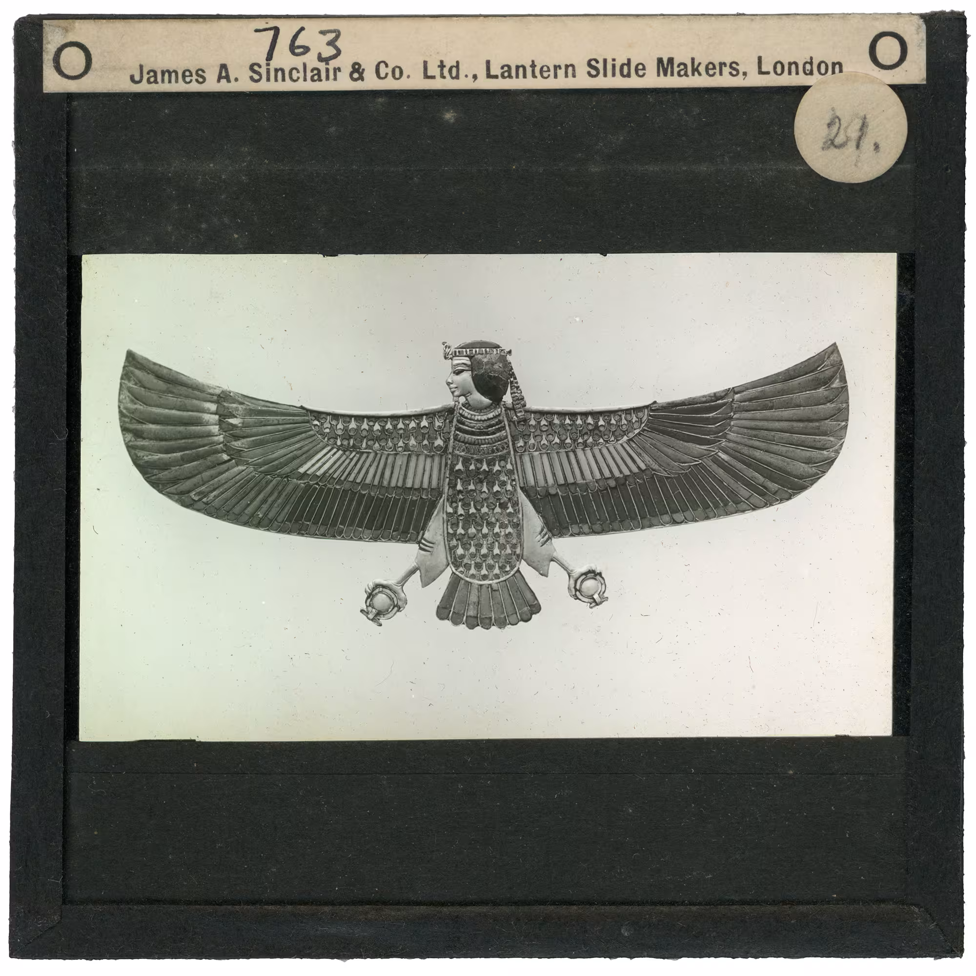 Image of lantern slide of human-headed bird ornament