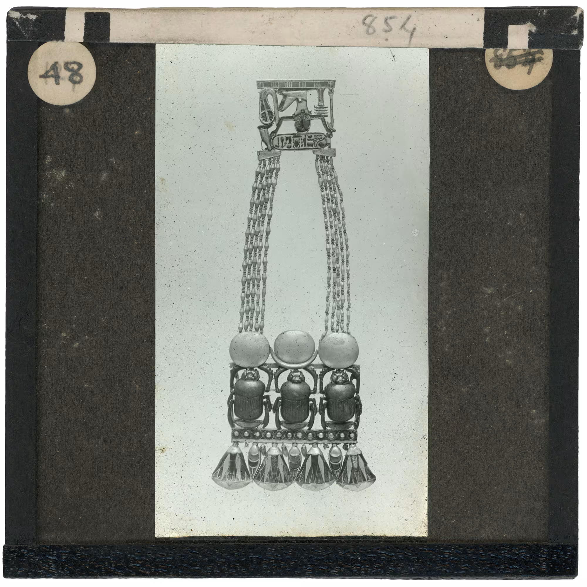 Image of lantern slide of necklace with scarabs