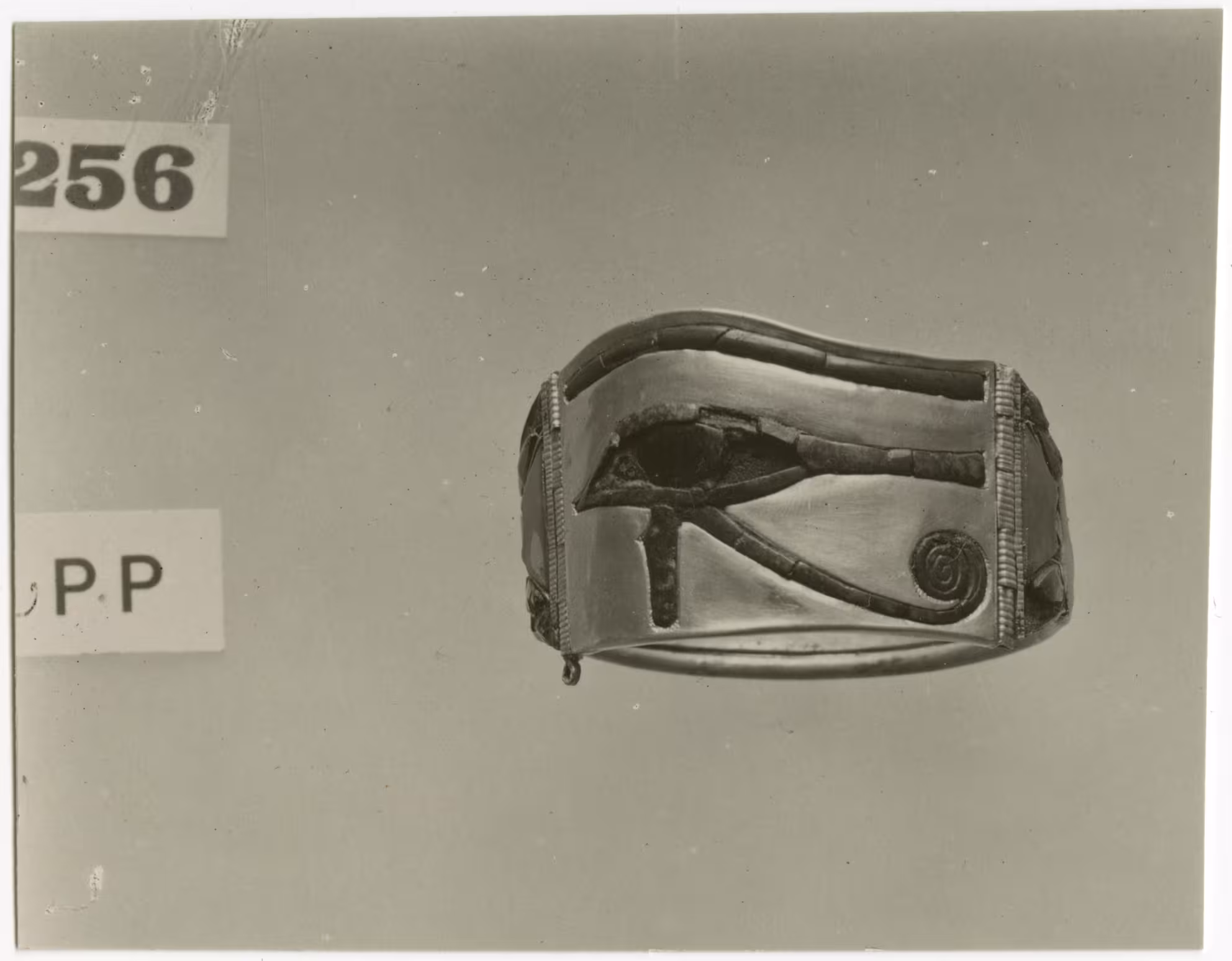 image of photographic print of gold wadjet-eye bracelet in object card