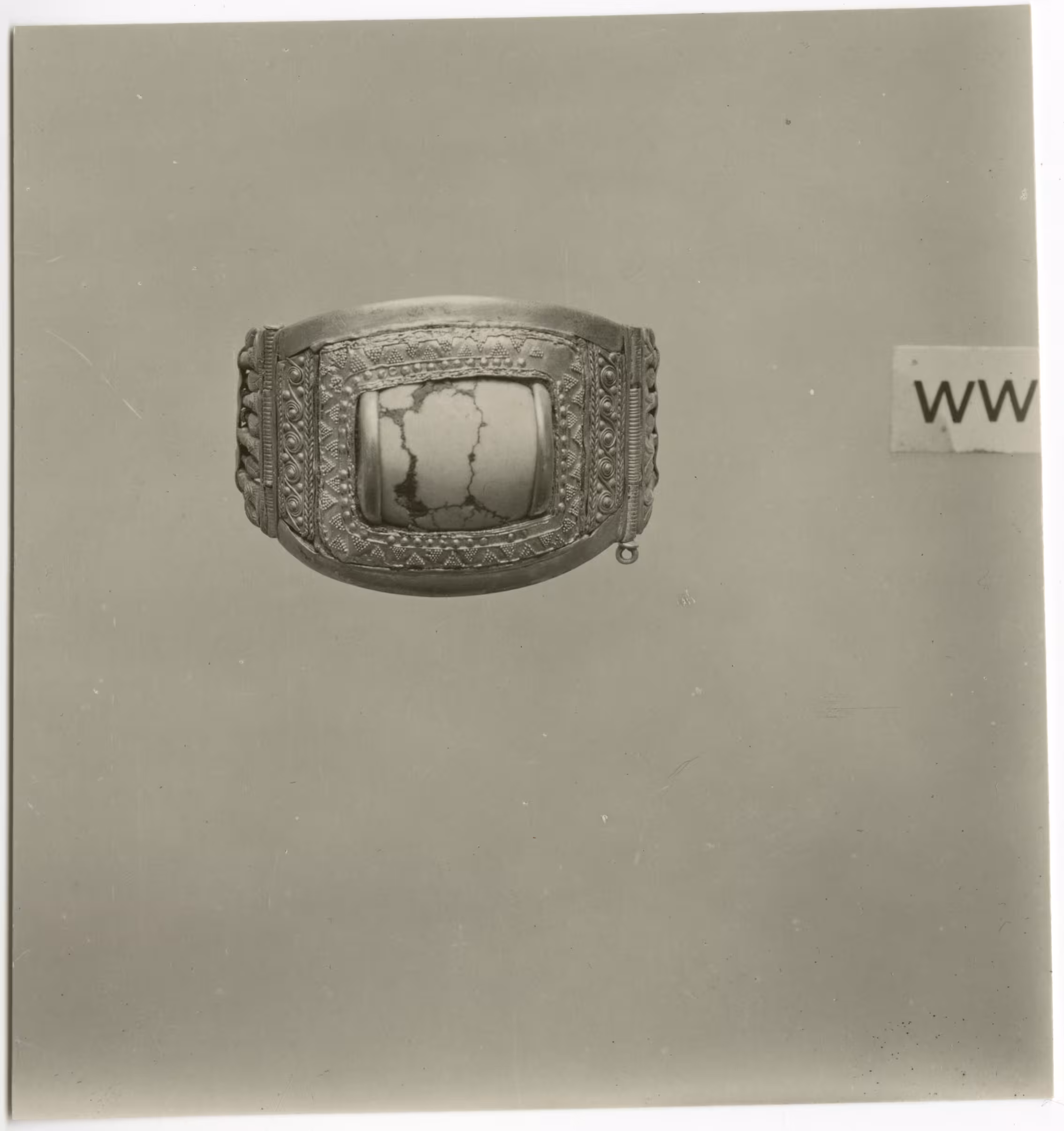 image of photographic print of gold bracelet in object card