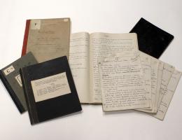stage image showing a selection of Lucas's journals and notes
