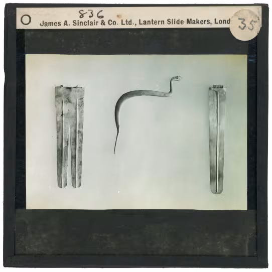 Image of lantern slide of three amulets