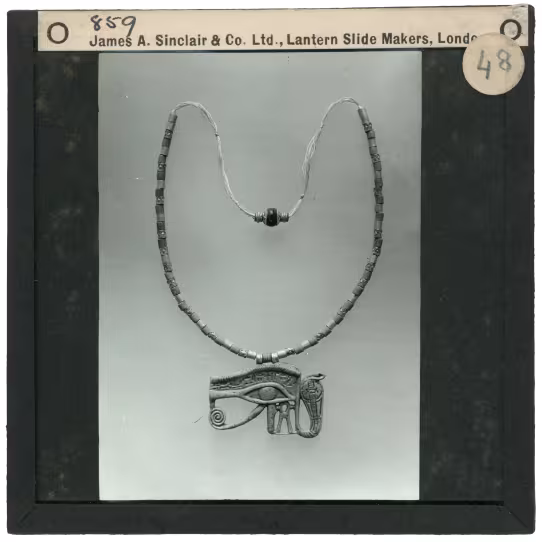 Image of lantern slide of necklace with eye amulet