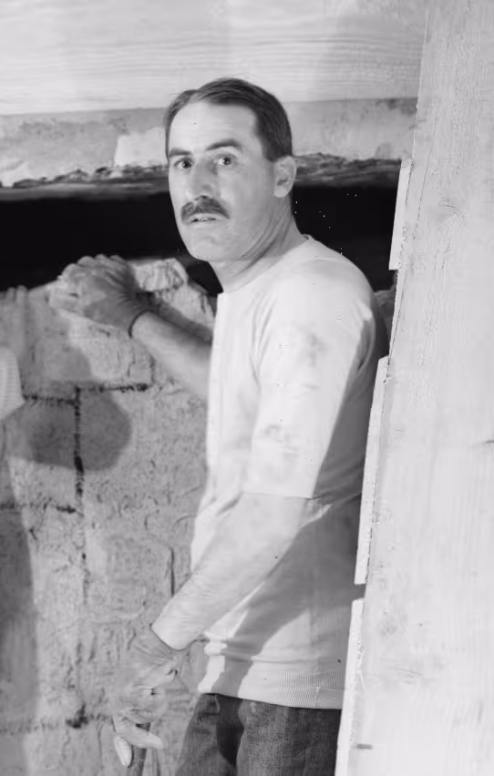 Photo of Howard Carter at work in the tomb of Tutankhamun