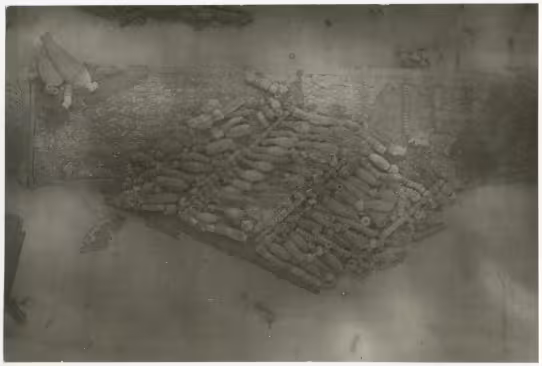 image of photographic print of dagger in situ in object card