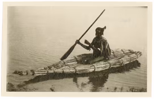 Photograph of man on boat