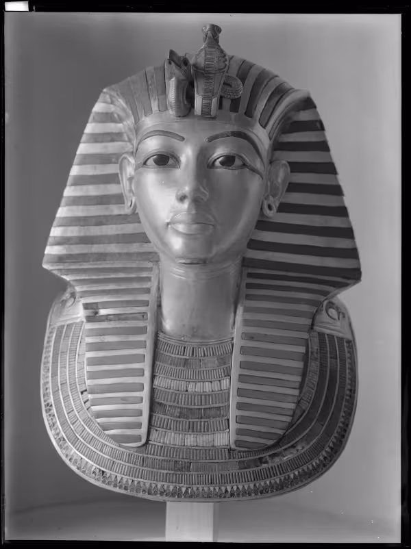 Image of gold mask of king negative