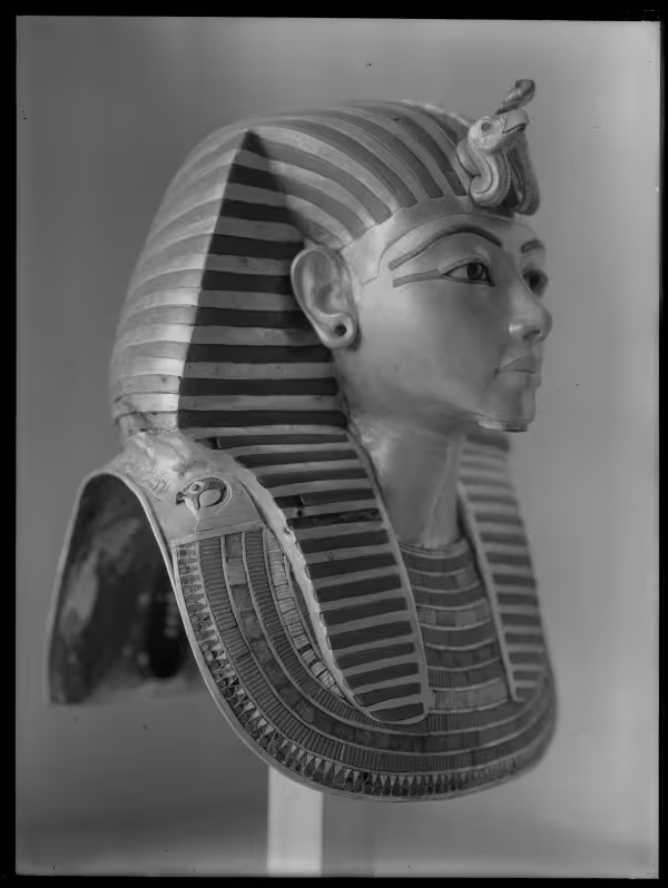 Image of gold mask of king negative