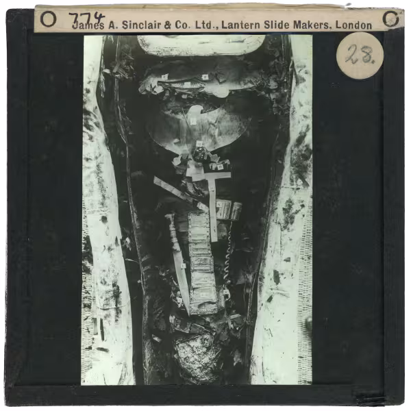Image of lantern slide of king's mummy lying in coffin