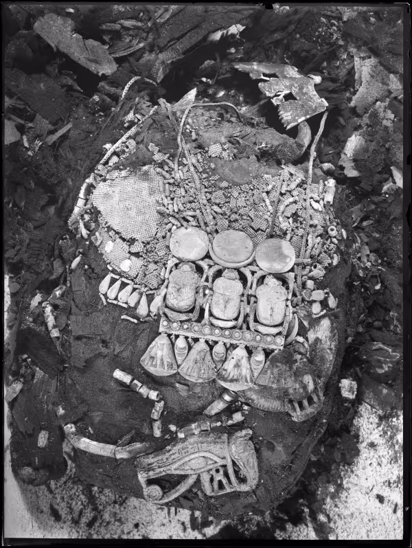 Image of negative of assorted jewellery on king's mummy