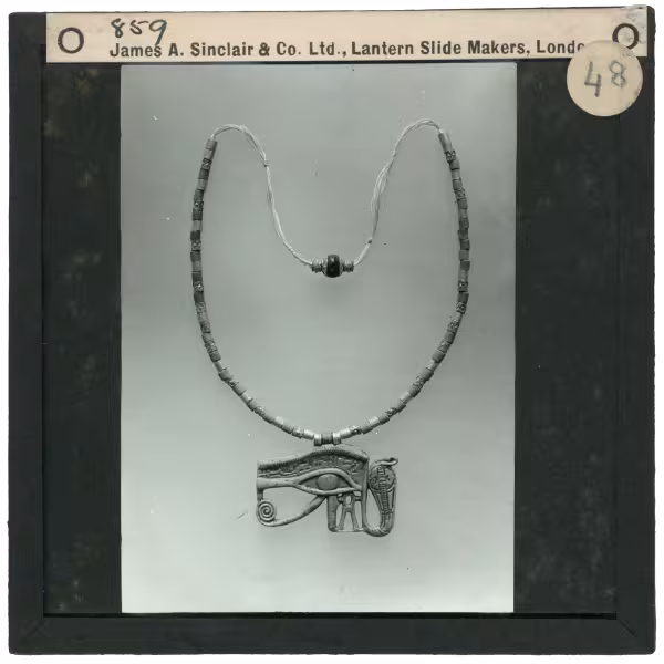 Image of lantern slide of necklace with eye amulet