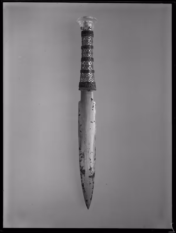 Image of negative of dagger with decorated handle and crystal knob as pommel
