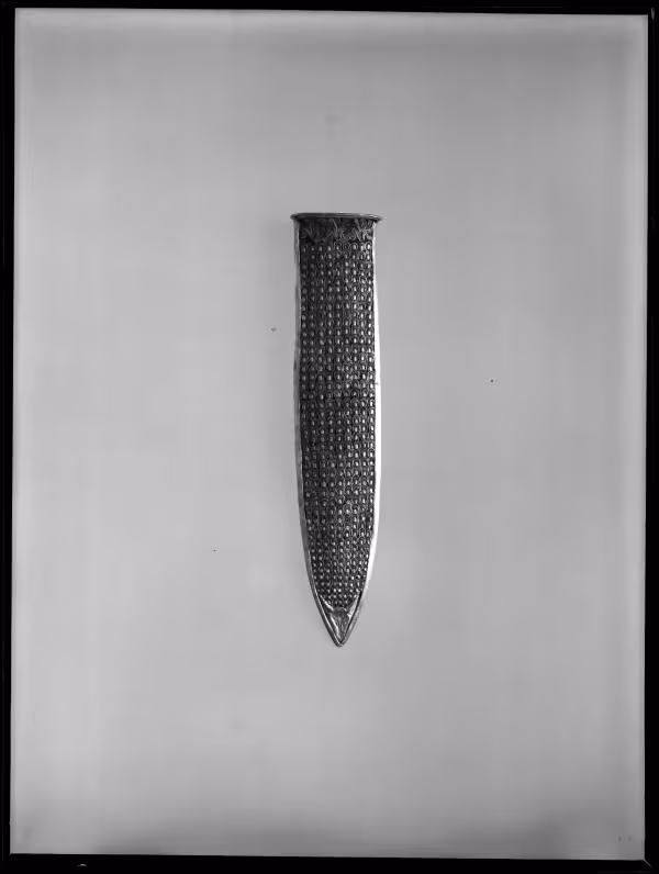 Image of negative of embossed dagger sheath