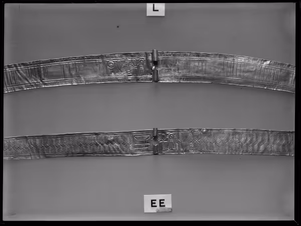 Image of negative of middle part of two girdles with incised decoration