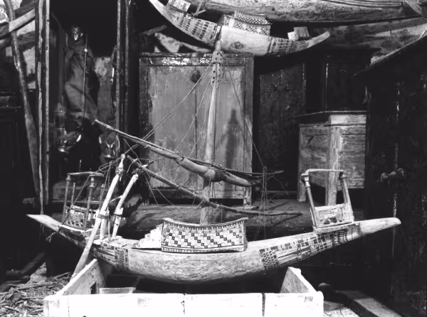 Image of many objects stacked inside tomb