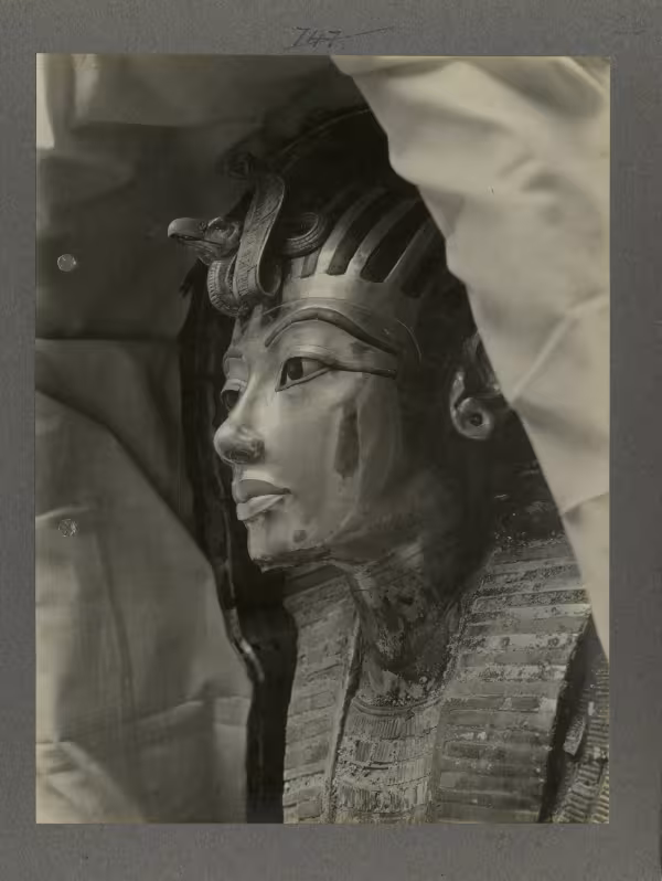 image of mummy mask within coffin from Burton's album