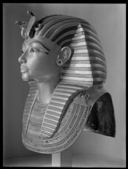 Image of gold mask of king negative