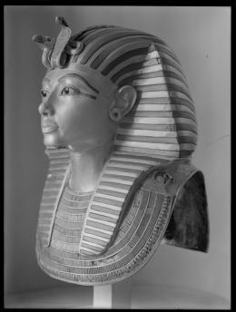 Image of gold mask of king negative