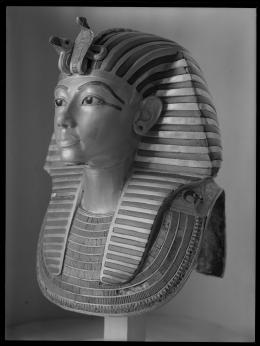 Image of gold mask of king negative