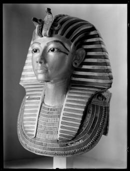 Image of gold mask of king negative