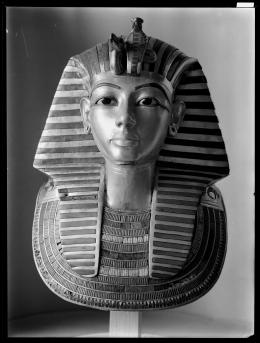 Image of gold mask of king negative