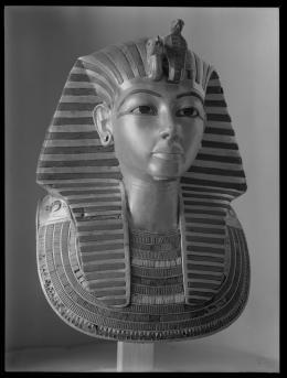 Image of gold mask of king negative