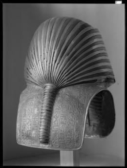 Image of gold mask of king negative