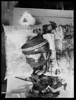 Image of negative of king's head disattached from mummy, wearing diadem
