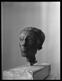 Image of negative of king's head disattached from mummy