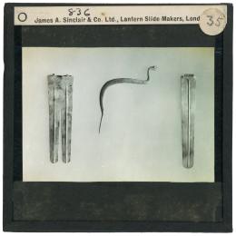 Image of lantern slide of three amulets