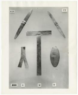 Image of print of five flat amulets