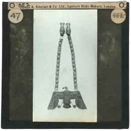 Image of lantern slide of necklace with vulture