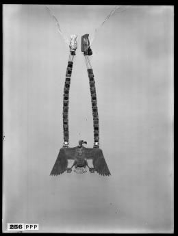 Image of negative of pectoral with vulture centrepiece and clasps shaped as birds