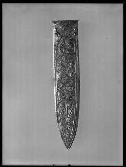 Image of negative of embossed dagger sheath