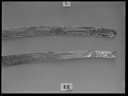 Image of negative of right part of two girdles with incised decoration