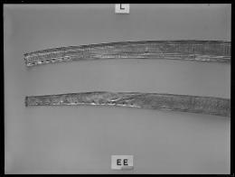 Image of negative of left part of two girdles with incised decoration