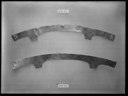 Image of negative of two flat gold bands