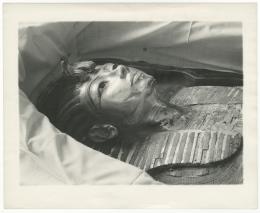Image of print of king's mask in coffin