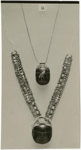 image of photographic print of two scarab pectorals in object card