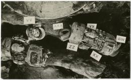 image of photographic print of king's arms with bracelets in object card