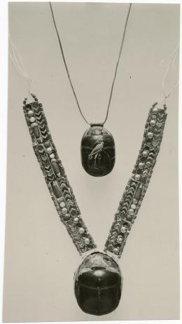 image of photographic print of two scarab pectorals in object card