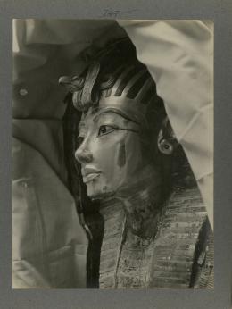 image of mummy mask within coffin from Burton's album