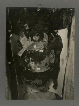 image of king's mummy during unwrapping, showing various amulets and jewellery, from Burton's album