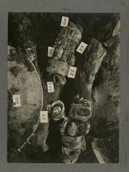 image of king's mummy during unwrapping, focusing on the arms, from Burton's album