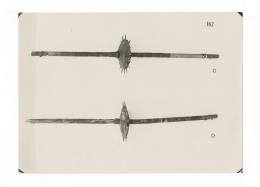Black and white photograph of harness goads