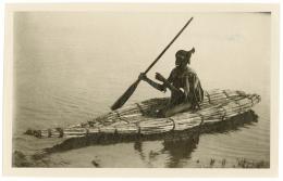 Photograph of man on boat